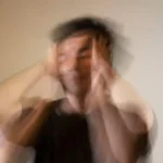 Blurry or bouncing vision while moving that causes vertigo